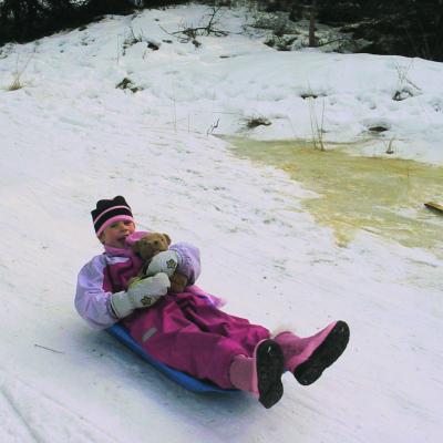 Tamsin on sledge Finland holiday 2007